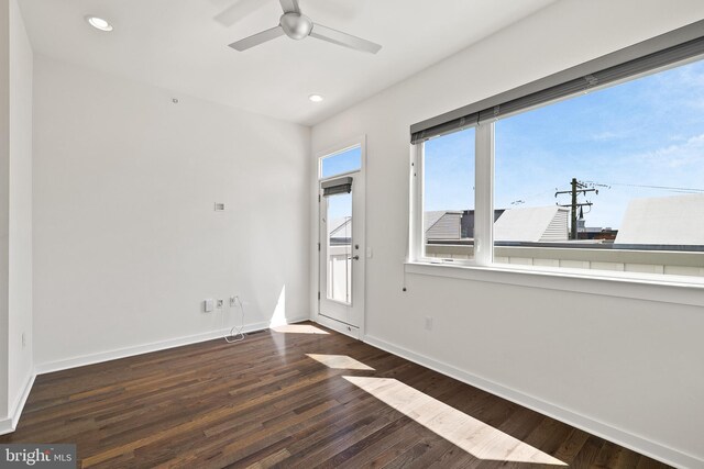 empty room featuring ceiling fan and wood-type flooring