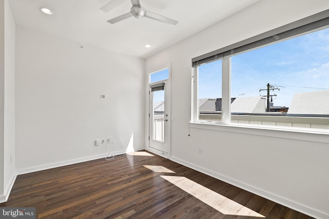 spare room with ceiling fan, baseboards, dark wood-style flooring, and recessed lighting