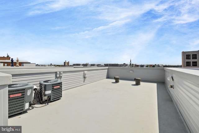 exterior space featuring a balcony and central AC unit