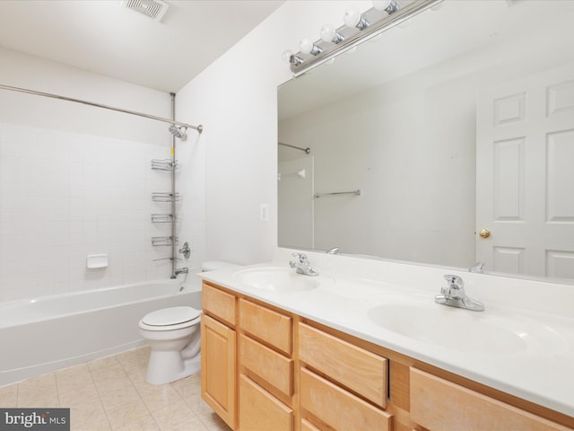 full bathroom with vanity, bathing tub / shower combination, toilet, and tile patterned floors