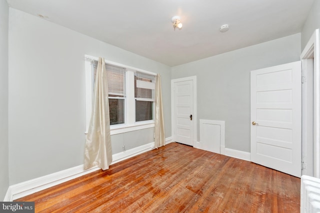 empty room with light wood-type flooring