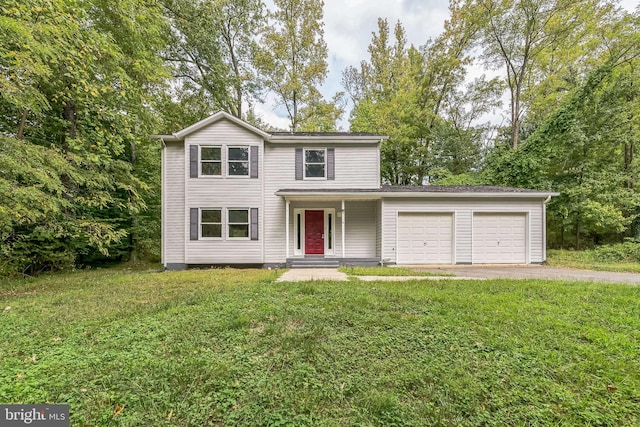 front facade with a front lawn, a porch, and a garage