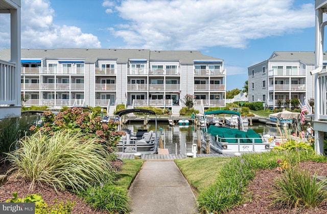 view of building exterior with a water view