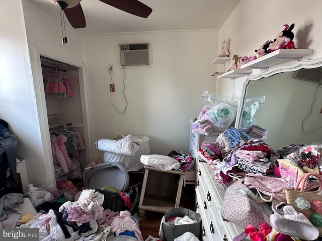 miscellaneous room with ceiling fan, ornamental molding, and a wall unit AC