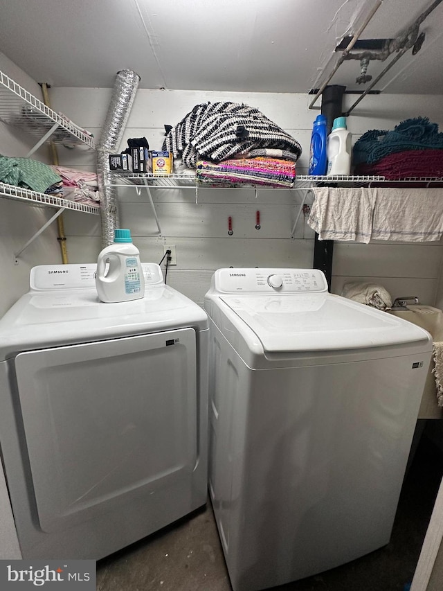 washroom featuring separate washer and dryer