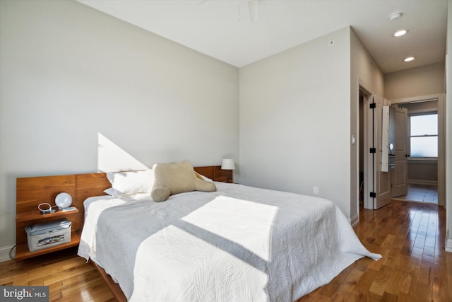 bedroom featuring hardwood / wood-style floors