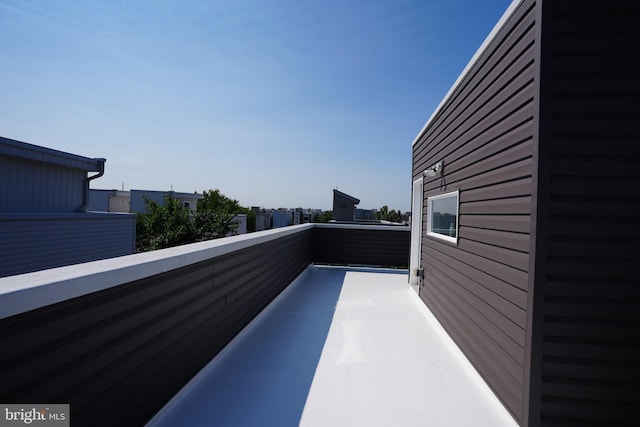 view of patio with a balcony