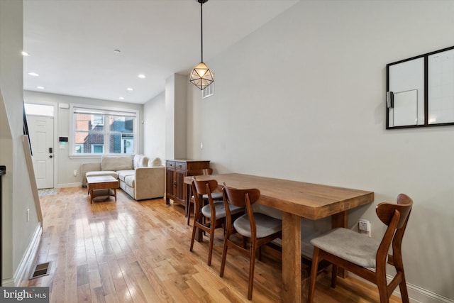 dining room with light wood-type flooring