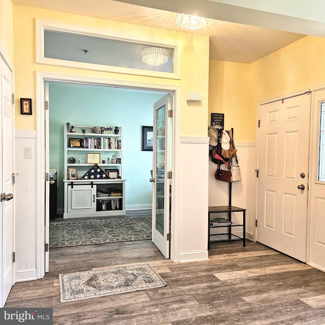 hallway with wood-type flooring