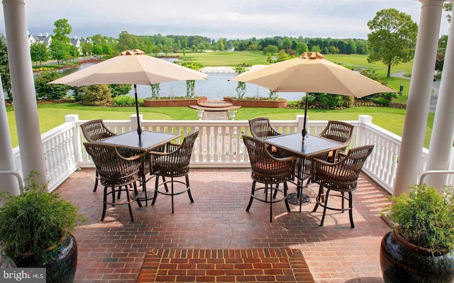 view of patio featuring outdoor dining area