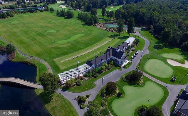 aerial view with view of golf course and a water view