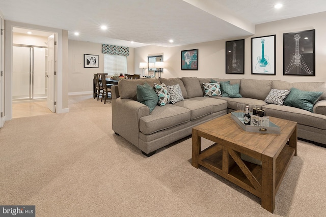 living room with light colored carpet