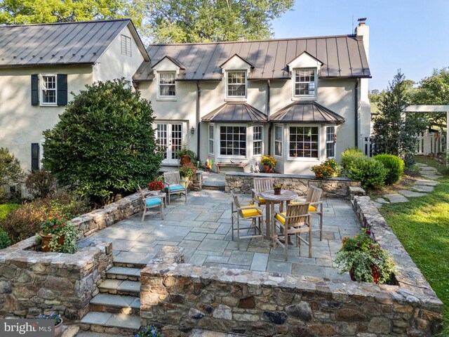 back of house featuring a patio