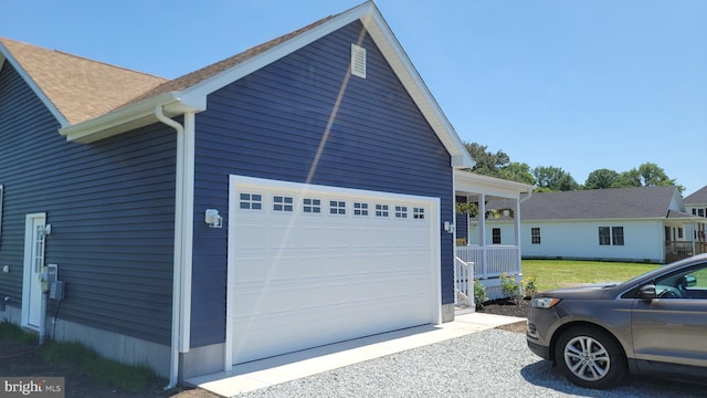 view of property exterior featuring a yard and a garage