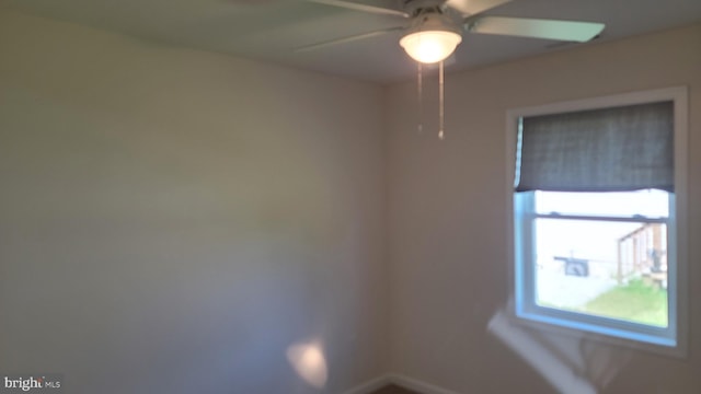 spare room featuring ceiling fan