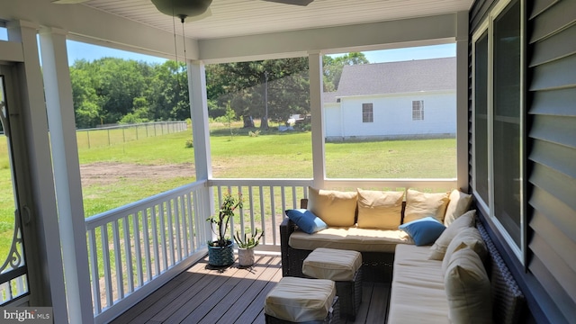 sunroom / solarium featuring a healthy amount of sunlight