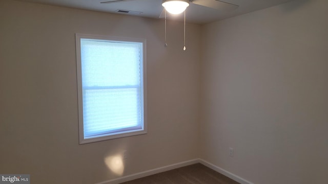 spare room with ceiling fan