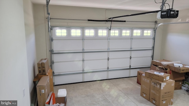 garage featuring a garage door opener