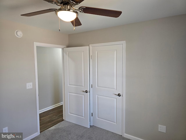 unfurnished bedroom with hardwood / wood-style floors and ceiling fan