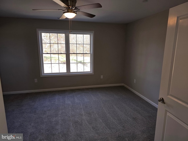 spare room with carpet flooring and ceiling fan