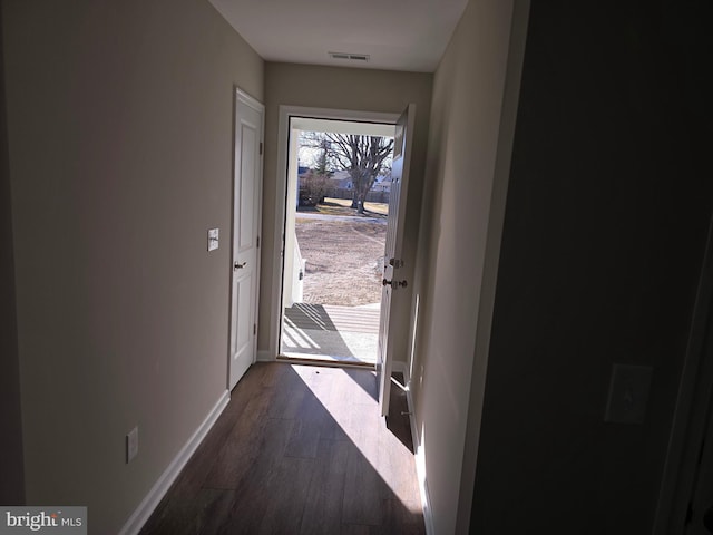 doorway to outside with dark hardwood / wood-style flooring