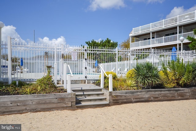 surrounding community featuring a swimming pool