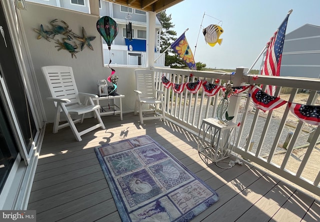 view of wooden balcony with a wooden deck