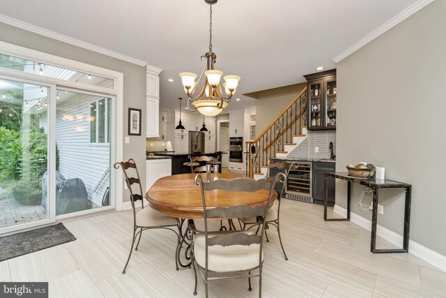 dining space featuring light tile patterned flooring, a chandelier, ornamental molding, and beverage cooler