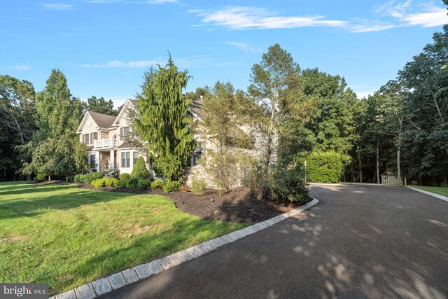 exterior space featuring a front lawn