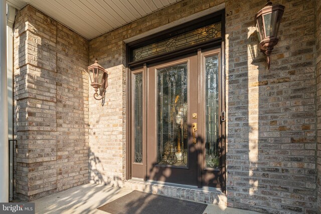 entrance to property with a porch