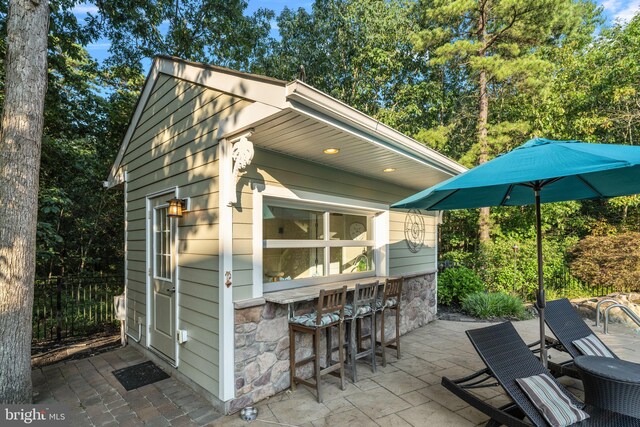 exterior space with an outdoor bar