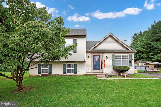 view of front of home with a front yard