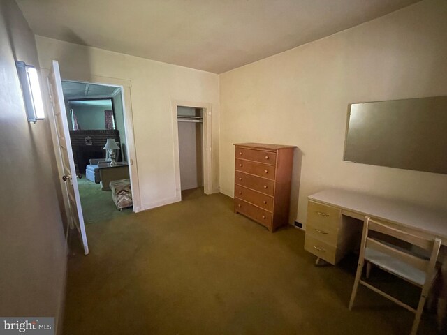 carpeted bedroom featuring a closet