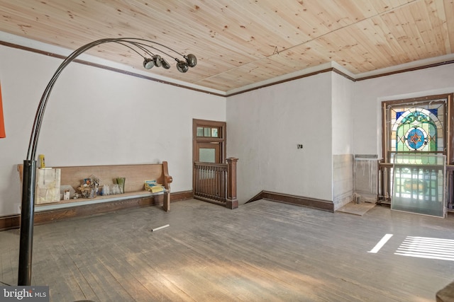 interior space featuring wood-type flooring and wood ceiling