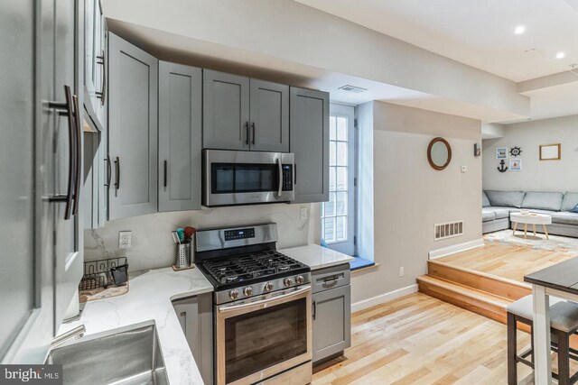 bathroom featuring hardwood / wood-style floors