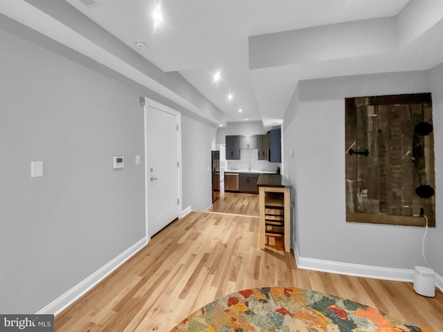 corridor featuring light hardwood / wood-style floors