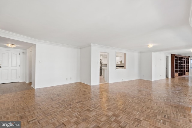 unfurnished living room with light parquet floors and ornamental molding