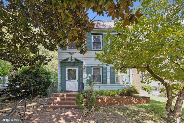 view of front of home featuring metal roof