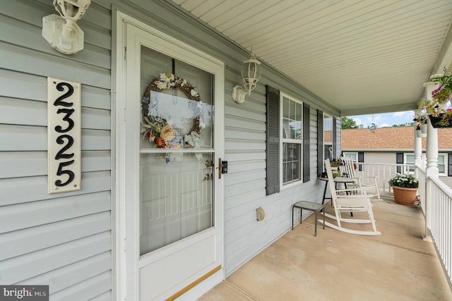 view of patio featuring a porch