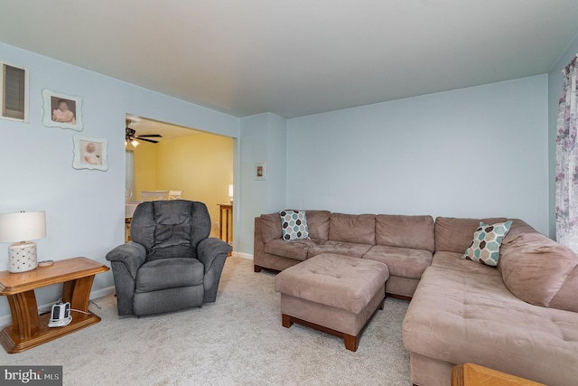 living area featuring carpet, visible vents, and baseboards