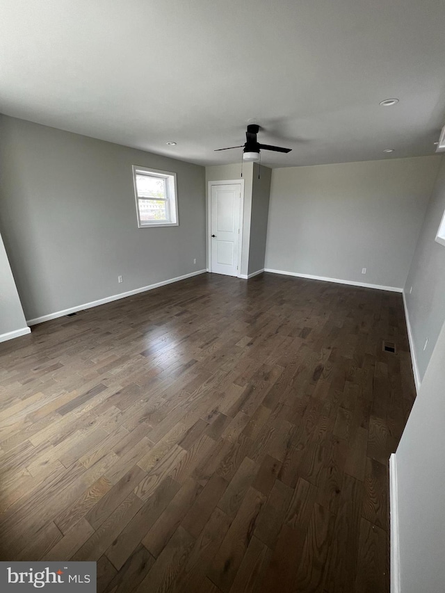 unfurnished room featuring ceiling fan and wood-type flooring