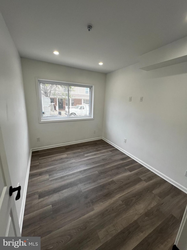 unfurnished room featuring hardwood / wood-style floors