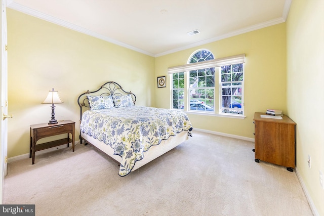 carpeted bedroom featuring ornamental molding