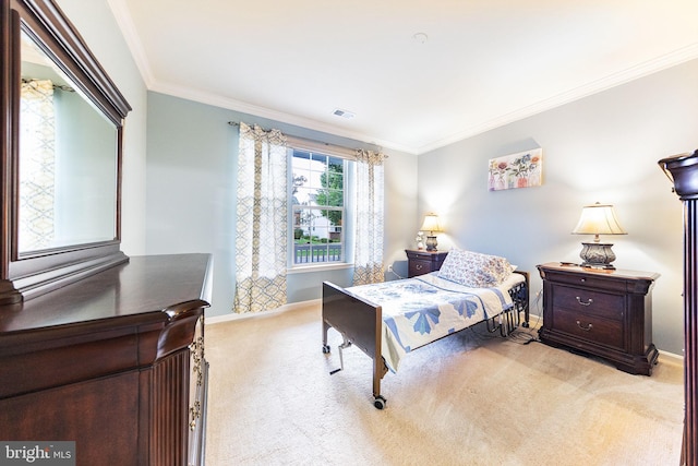 bedroom with light carpet and crown molding