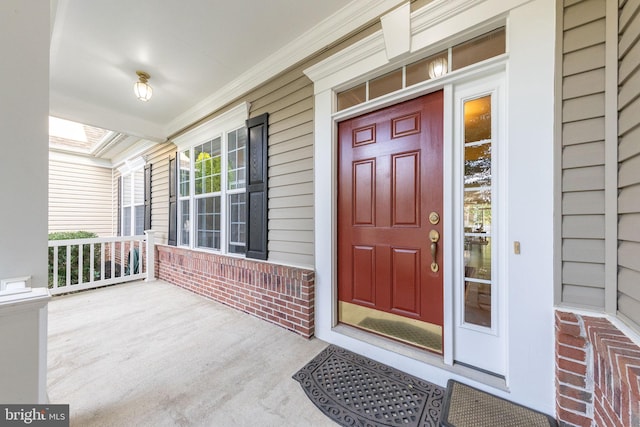 property entrance with a porch