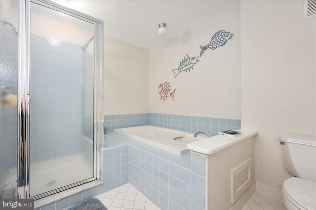 bathroom featuring tile patterned flooring, independent shower and bath, and toilet