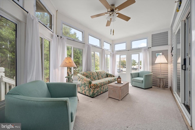 sunroom / solarium with ceiling fan