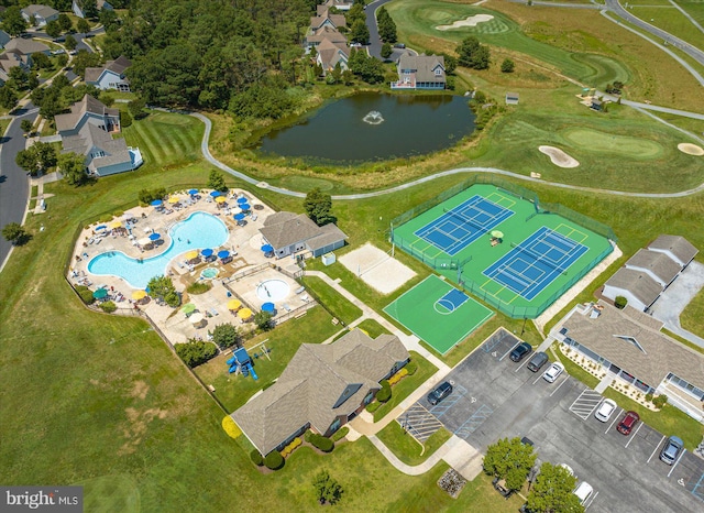 birds eye view of property featuring a water view