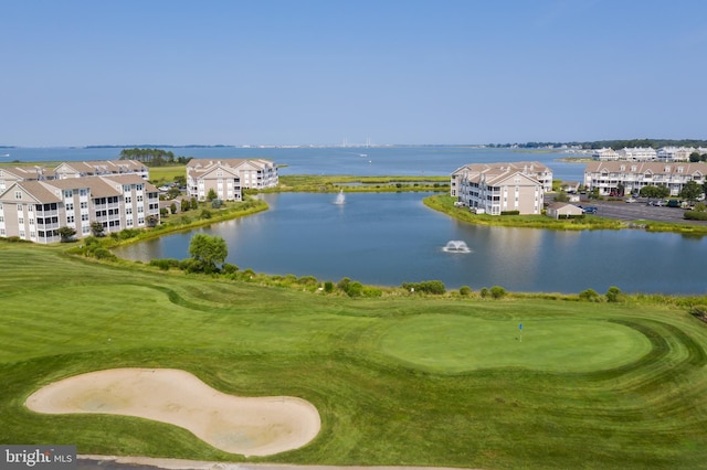 view of home's community with a water view