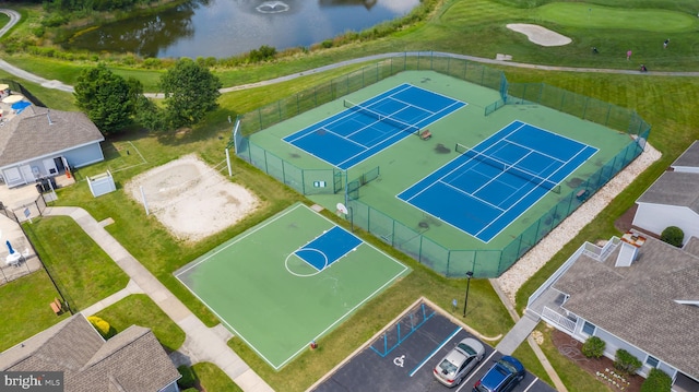 birds eye view of property featuring a water view